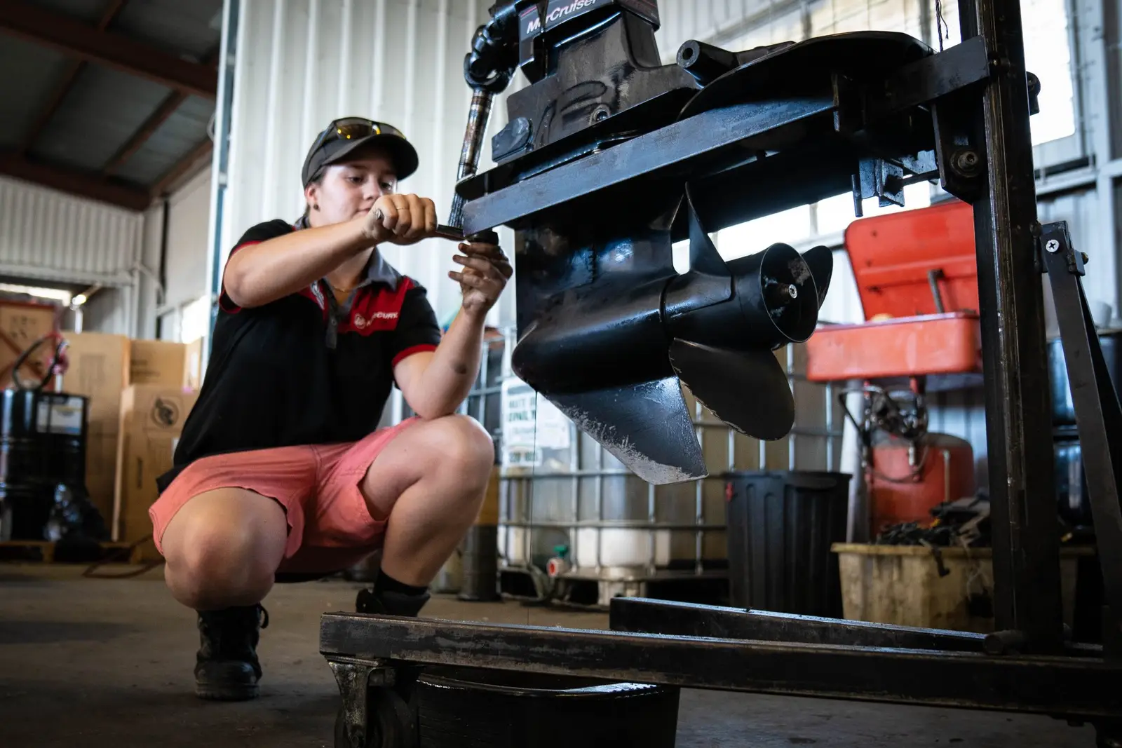 Mike’s Marine technician servicing an outboard leg