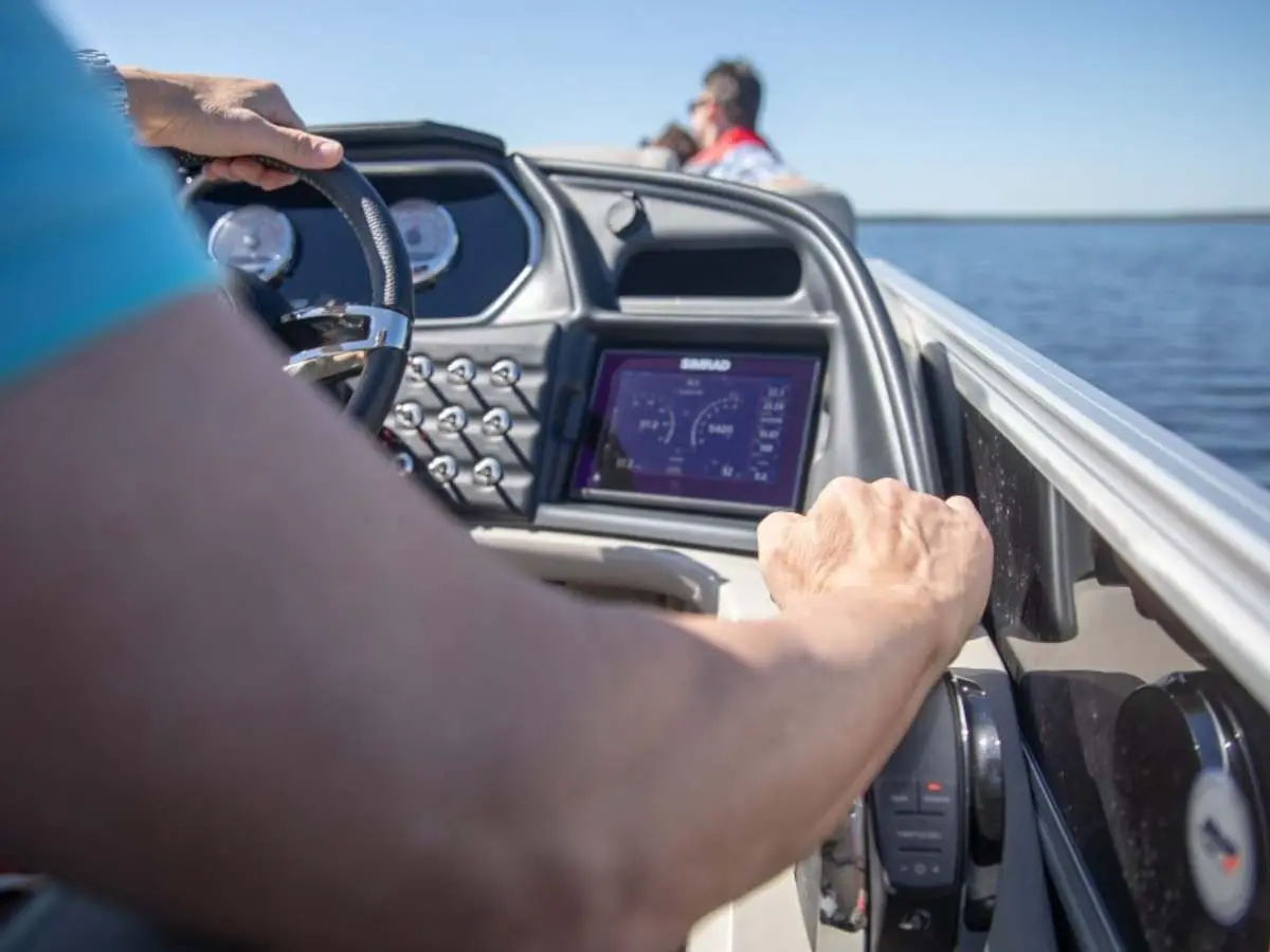 Boat owner at the helm