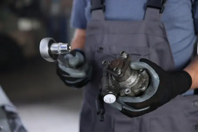Marine mechanic working on an outboard